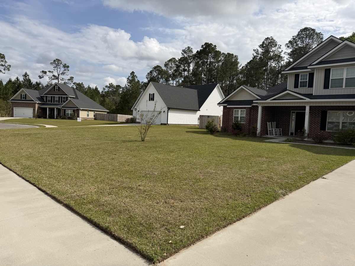 Aerated residential lawn by A&P Lawn Care in Liberty County, GA